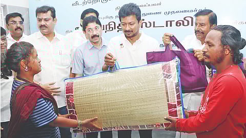 Deputy Chief Minister distributes mats, pillows to beneficiaries after the inauguration