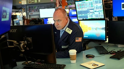 Derek Orth works on the floor at the New York Stock Exchange in New York,