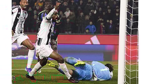 Juventus' Pierre Kalulu, center, scores a goal during the Serie A soccer match between Pisa and Juventus in Pisa, Italy.