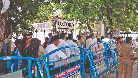 Aspirants waiting outside the US Consulate in Chennai