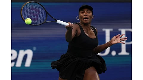 Venus Williams, of the United States, during a quarterfinal doubles match at the US Open tennis championship in New York. 