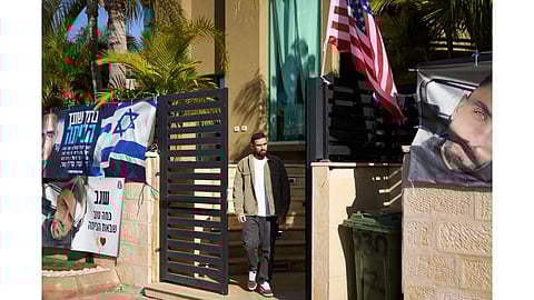 Segev Kalfon, an Israeli hostage who spent two years in captivity in a Hamas tunnel and was released from the Gaza Strip in a ceasefire deal on October 13, steps out of his home in Dimona, southern Israel.