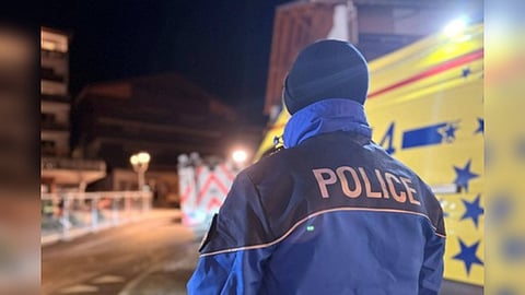 Police secure the street after a deadly New Year’s Eve bar fire in an Alpine ski resort town.