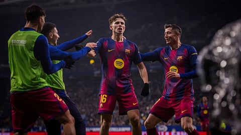 Dani Olmo and Robert Lewandowski each scored a goal and secured win against local rivals Espanyol.