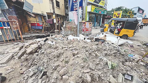 Uncleared debris from the storm water drain on Thiru Nagar 1st Street on Monday evening