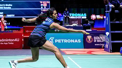  PV Sindhu returns a shot during a match