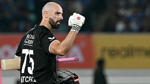Daryl Mitchell celebrates after his century