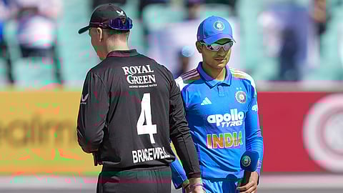 India's captain Shubman Gill, right, and New Zealand's captain Michael Bracewell during the toss before the second ODI cricket match of a series between India and New Zealand, at Niranjan Shah Stadium, in Rajkot, Gujarat, Wednesday, Jan. 14, 2026