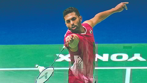 H S Prannoy returns a shot during his match