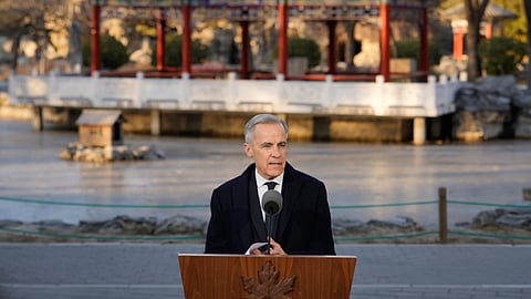 Canada's Prime Minister Mark Carney, speaks to the media at Ritan Park in Beijing, China