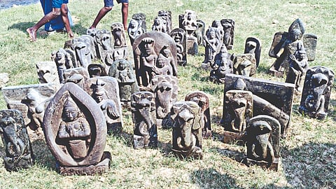 Recovered idols on the banks of Cooum River in Pinjivakkam village in Kadambathur near Tiruvallur