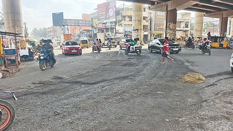 Damaged road beneath Madavakkam flyover at the intersection of Mambakkam-Medavakkam Main Road cries for immediate attention