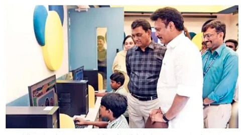 Anbil Mahesh Poyyamozhi and officials look on as students get trained at new resource centre in Nungambakkam