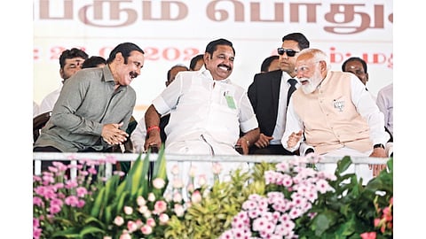 PM Modi sharing a lighter moment with Edappadi Palaniswami and Anbumani Ramadoss at the NDA’s first election campaign meeting in Chengalpattu on Friday (January 23)