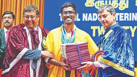 EL Arunaneshwaran with the 23 honours he received from the Governor-Chancellor RN Ravi (r) at the Tanuvas convocation