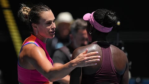 Aryna Sabalenka, left, of Belarus is congratulated by Victoria Mboko, right, of Canada following their fourth round match at the Australian Open tennis championship in Melbourne, Australia