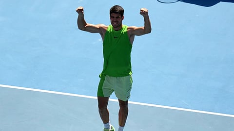 Carlos Alcaraz of Spain celebrates after defeating Tommy Paul of the U.S. during their fourth round match at the Australian Open tennis championship in Melbourne, Australia.