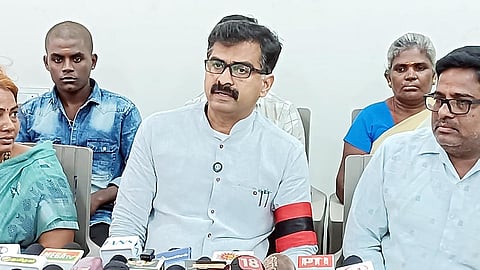 Durai Vaiko addressing the media in Tiruchy as parents of Kishore Saravanan look on