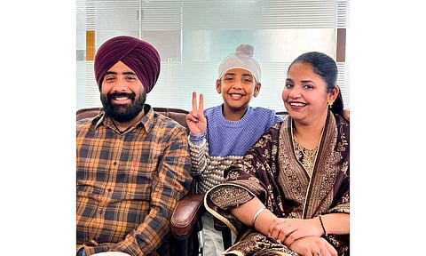 Vanshpreet Singh with his wife Anmol Kaur and their minor son. The couple, who are deaf and mute, run a cloud kitchen in Punjab's Mohali, named 'Quietly Delicious'