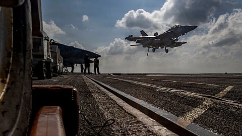 This handout image from the U.S. Navy shows an EA-18G Growler landing on the flight deck of the Nimitz-class aircraft carrier USS Abraham Lincoln in the Indian Ocean.