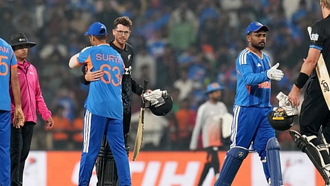 Mitchell Santner with Surya Kumar Yadav 