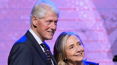 Former President Bill Clinton (L) and former Secretary of State Hillary Clinton (R)