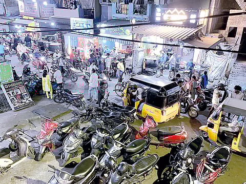 Crowds throng 24/7 fast-food joints on Decoster Road in Pulianthope, resulting in traffic congestion