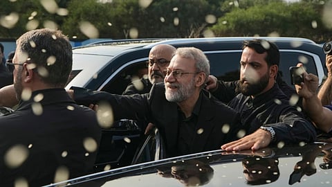 Ali Larijani, center, secretary of Iran's Supreme National Security Council