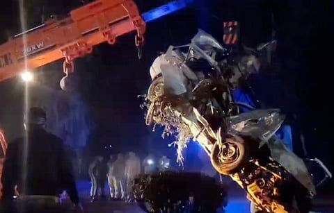 Wreckage of a car being removed from the road after its collision with a truck, in Dausa district, Rajasthan, Tuesday night, Feb. 10, 2026. At least six people were killed in the accident.