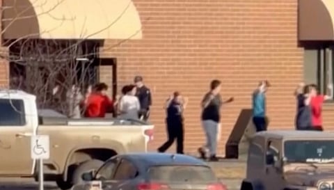 This grab from video shows students exiting the Tumbler Ridge school after deadly shootings, in British Columbia, Canada