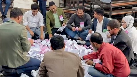 Polling officials during counting of votes after the parliamentary elections, in Dhaka, Bangladesh