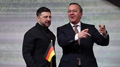 Ukrainian President Volodymyr Zelenskyy, left, and German Defence Minister Boris Pistorius talk during their visit of drone producing company Quantum Frontline Industries near Munich, Germany