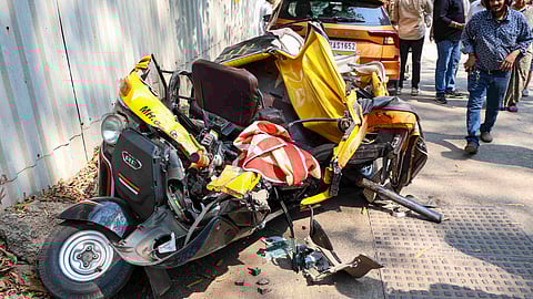 Damaged vehicles after a slab of the girder bridge of under-construction metro rail line 4 collapsed on a few vehicles, killing at least one person and injuring three others, at Mulund area