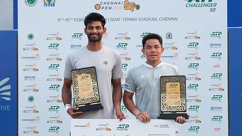 Doubles champions Pruchya Isaro and Niki Kaliyanda Poonacha