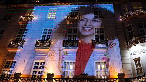 Nobel Peace Prize recipient Narges Mohammadi is projected on the wall of the Grand Hotel in central Oslo before the Nobel banquet