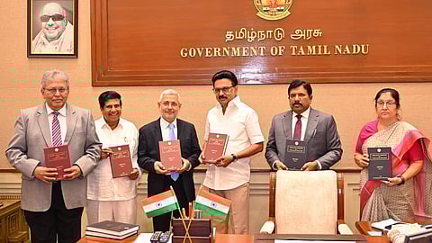 Chief Minister MK Stalin with the report submitted by high-level committee members in Chennai on Monday