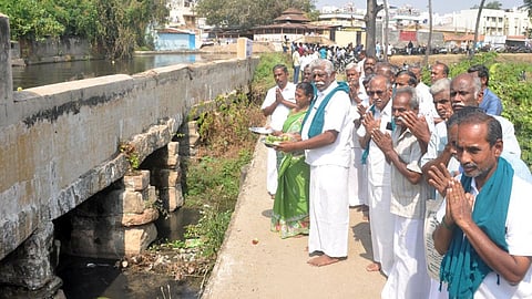 Farmers offer prayers to the historic bridge in Erode
