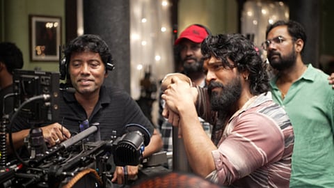(L-R)  Rathnavelu and Ram Charan 