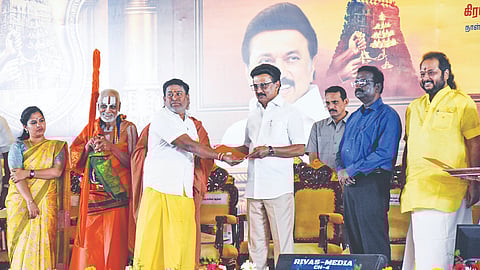Chief Minister MK Stalin with beneficiaries at the conference
organised by the HR&CE department in Mylapore on Saturday