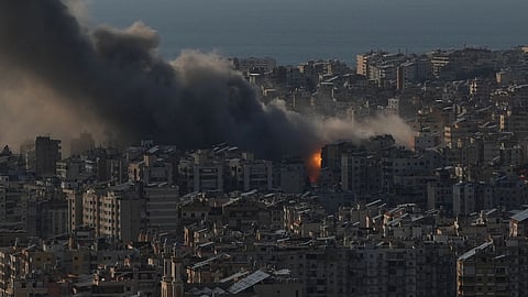 Flames and smoke rise following Israeli airstrikes on Dahiyeh, a southern suburb of Beirut, Lebanon, Monday, March 2, 2026