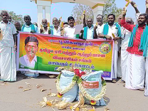 Farmers stage a protest in Tiruchy on Monday