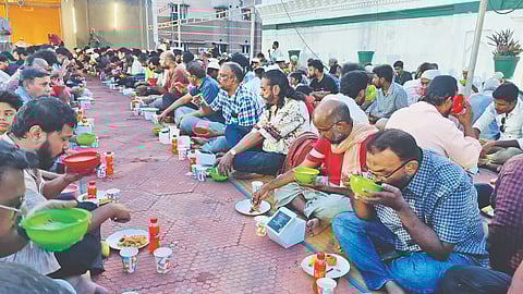 Participants of the walk sharing Iftar meals