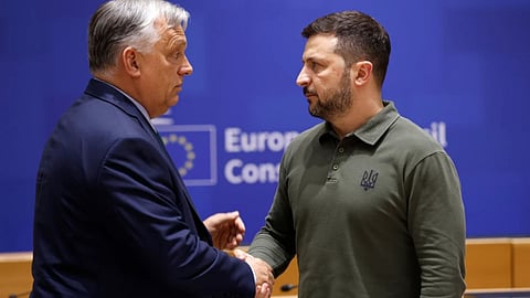 Hungary’s Prime Minister Viktor Orban, left, speaks with Ukraine’s President Volodymyr Zelenskyy
