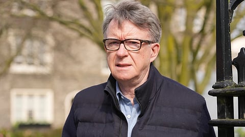 Peter Mandelson, the former UK ambassador to the United States, leaves his house in London