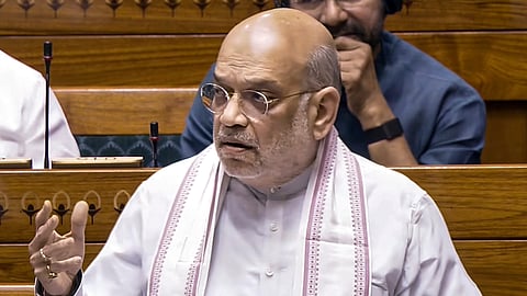 Union Home Minister Amit Shah speaks in the Lok Sabha during the second part of Budget session of Parliament, in New Delhi, Wednesday, March 11, 2026 