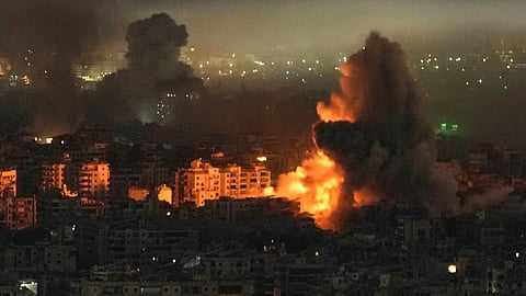 Smoke and flames rise from buildings following an Israeli airstrike in Dahiyeh, Beirut's southern suburbs, Lebanon