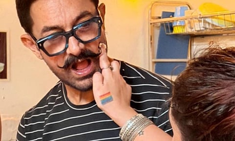 Ira Khan puts cake on dad Aamir Khan's face