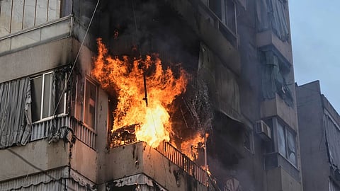 Smoke and flame rise from a residential building following an Israeli airstrike in central Beirut, Lebanon