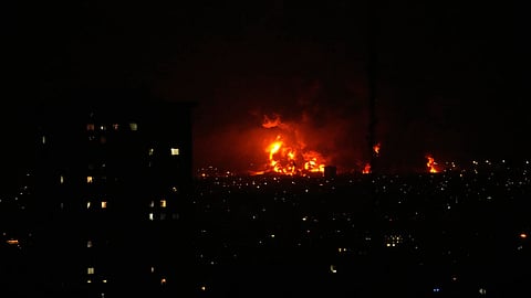 Flames rise from an oil storage facility south of the capital Tehran as strikes hit the city during the U.S.–Israel military campaign, Iran