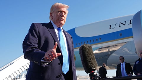 President Donald Trump speaks with the media before boarding Air Force One, Monday, March 23, 2026, at Palm Beach International Airport in West Palm Beach, Fla. 
